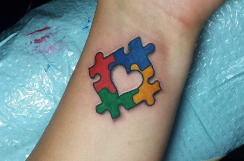 Jigsaw puzzle pieces tattoo